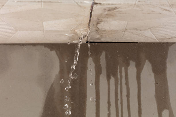 Professional Flood Damage Cleanup technician working in Cherry Valley, MA